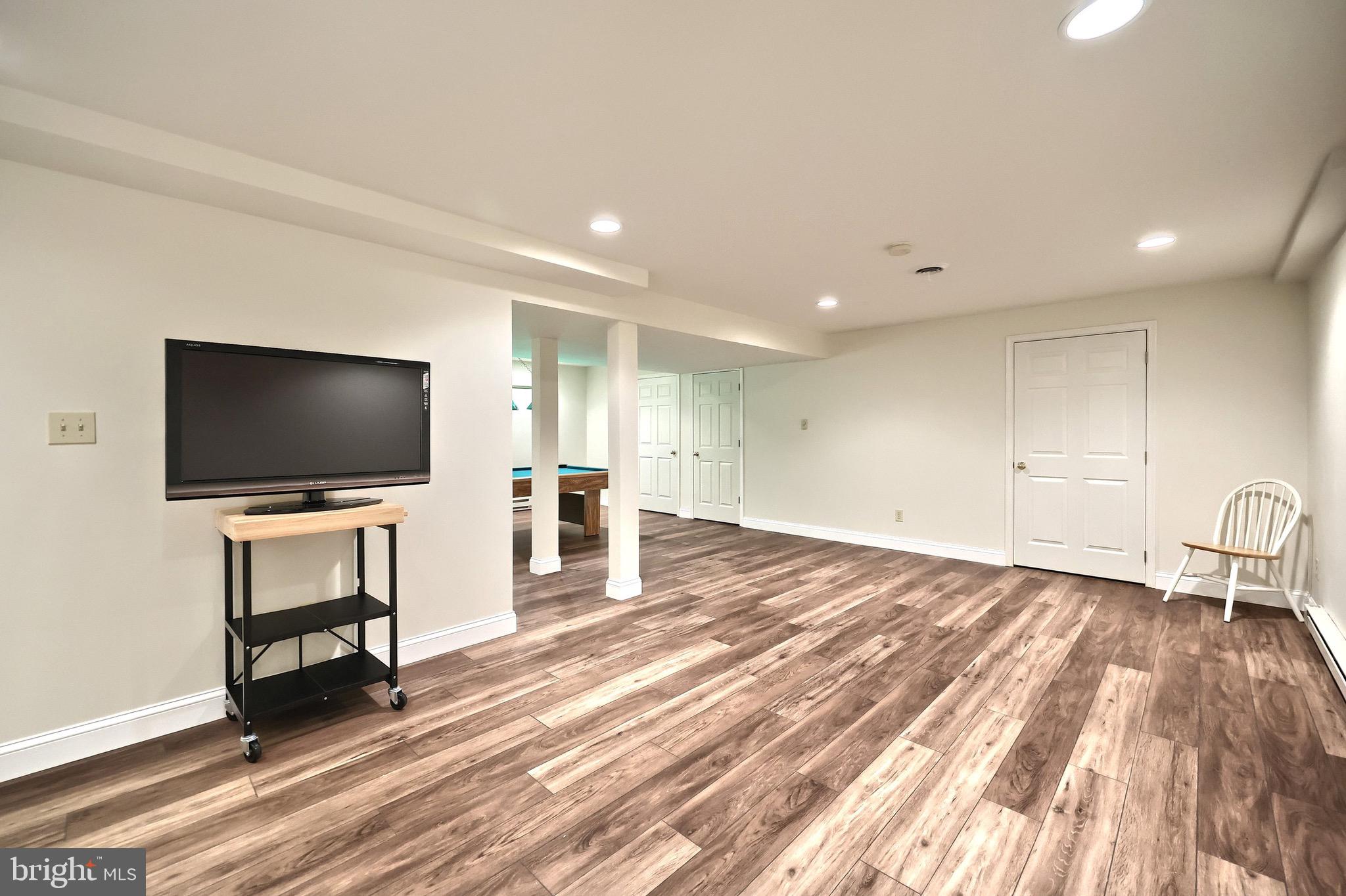 70 Test Road Hanover, PA 17331 - Photo 27 of 39 a living room with furniture and a flat screen tv