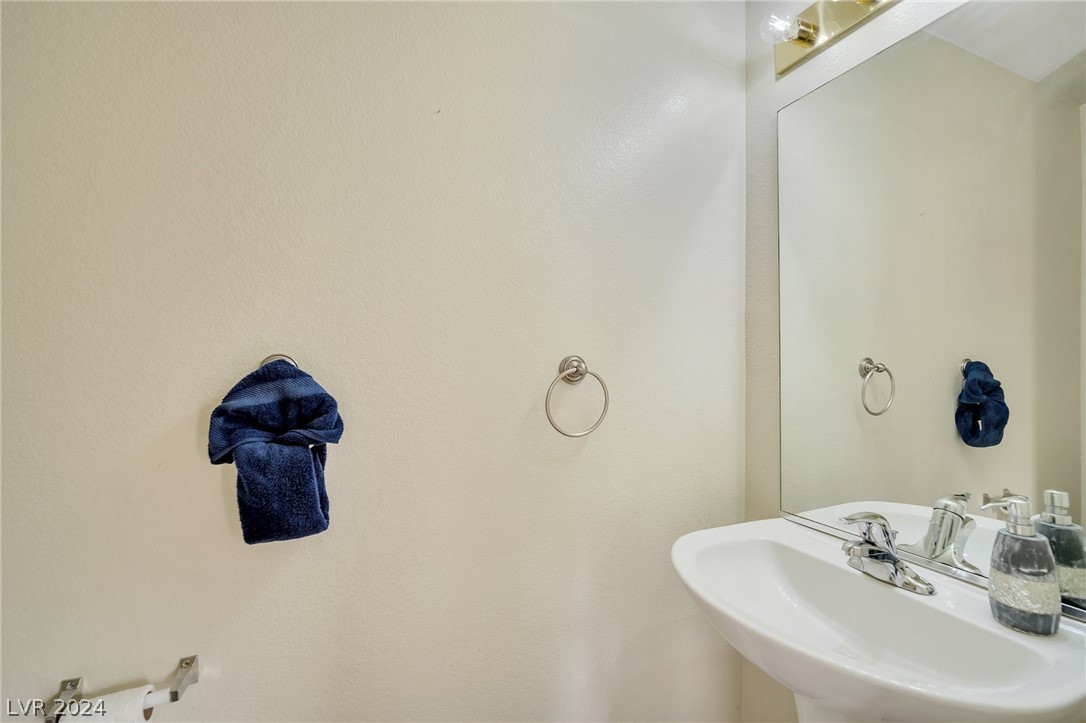 1968 Flagstone Ranch Lane Henderson, NV 89012 - Photo 17 of 53 Downstairs powder room