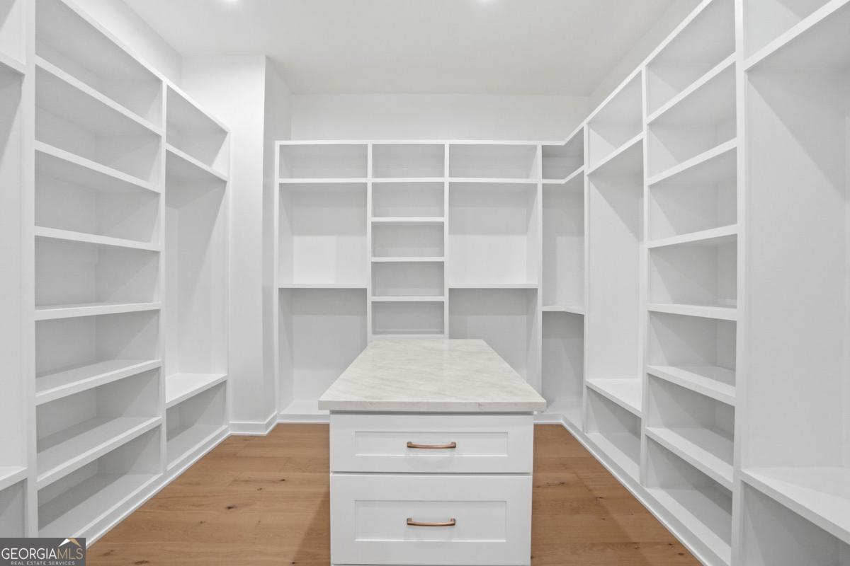 1557 Whitley Road Dacula, GA 30019 - Photo 23 of 46 a view of an empty walk in closet