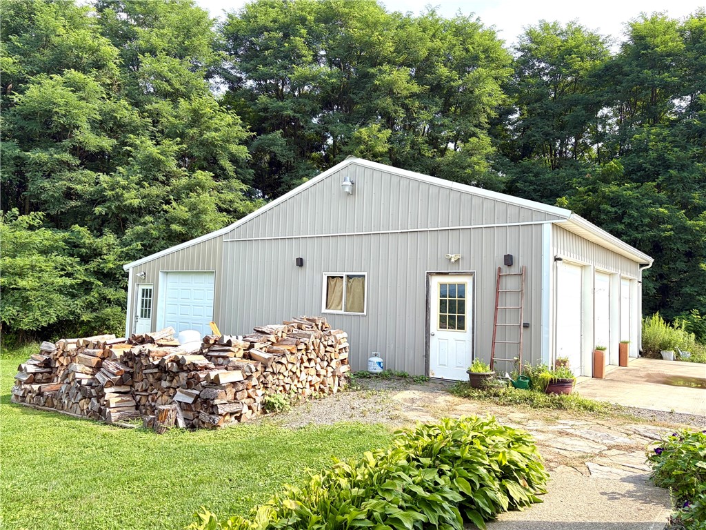 3700 Wine Mt Road Hector, NY 14818 - Photo 48 of 50 Four bay garage, 3 spaces in front and one in back with workshop