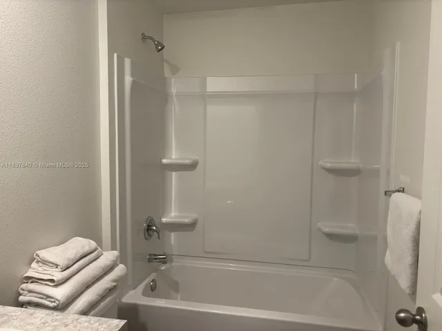 a bathroom with a tub