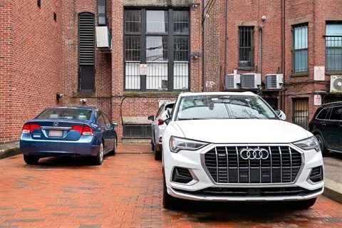 a car parked in front of a house