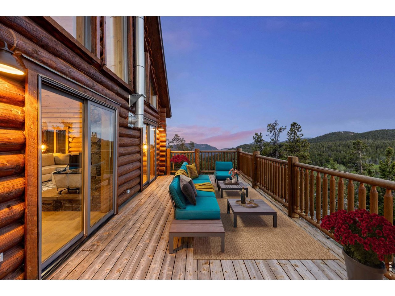 1028 Rudi Lane Golden, CO 80403 - Photo 19 of 46 a balcony with wooden floor and outdoor seating