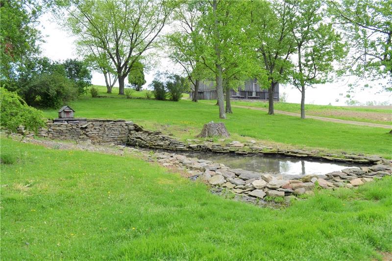 210 Fisher Road Creekside, PA 15732 - Photo 11 of 21 A fresh spring feeds this small pond