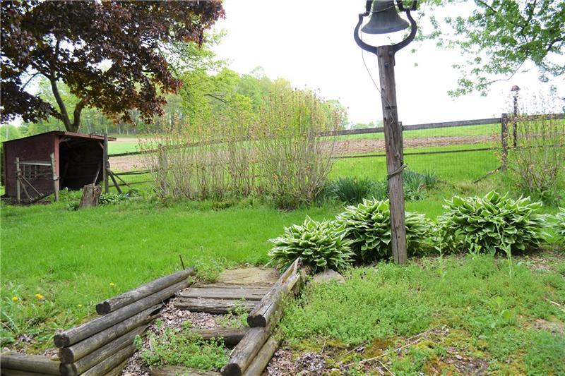 210 Fisher Road Creekside, PA 15732 - Photo 19 of 21 A fenced in area and shelter used to contain alpacas.