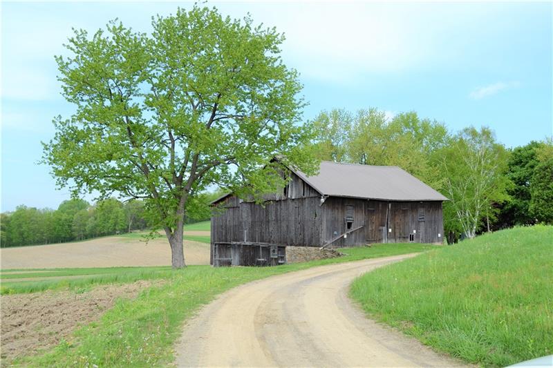 210 Fisher Road Creekside, PA 15732 - Photo 7 of 21 The barn is currently used to house farm equipment but has held cattle in the past