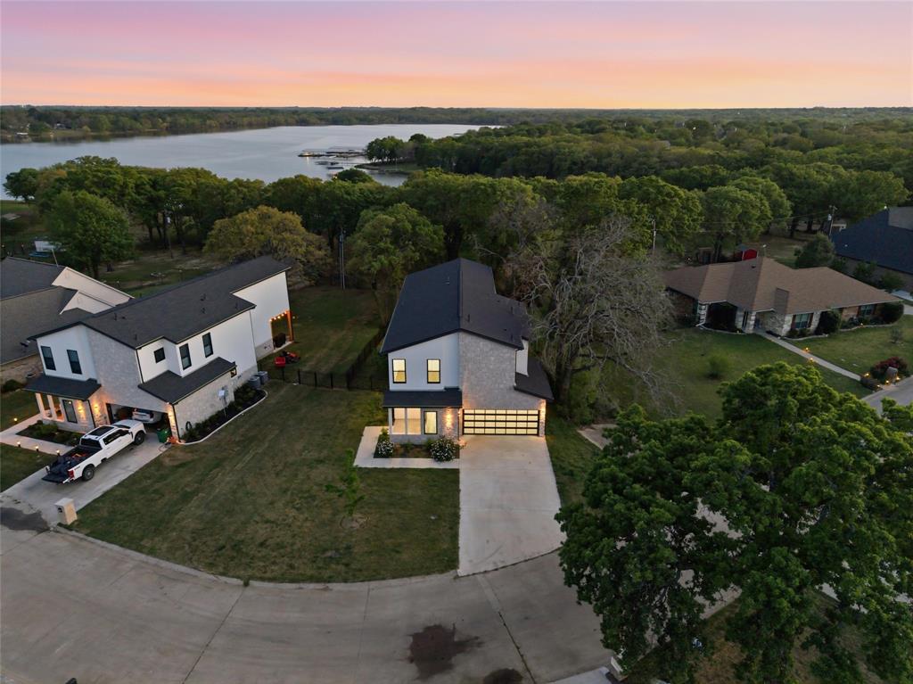 2811 Rodeo Drive Quinlan, TX 75474 - Photo 38 of 38 an aerial view of a house with a garden