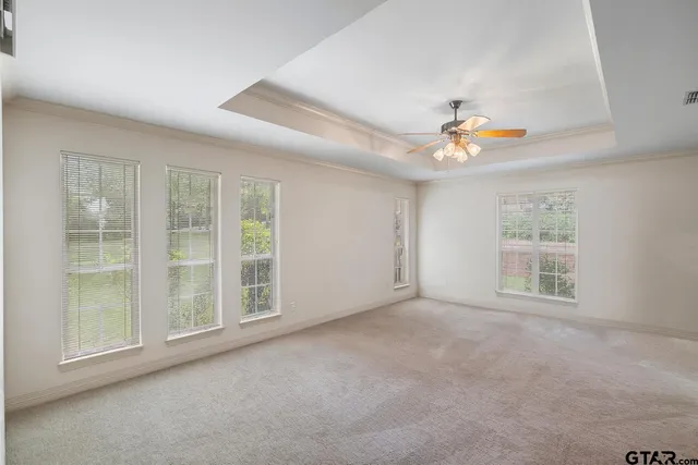 an empty room with windows