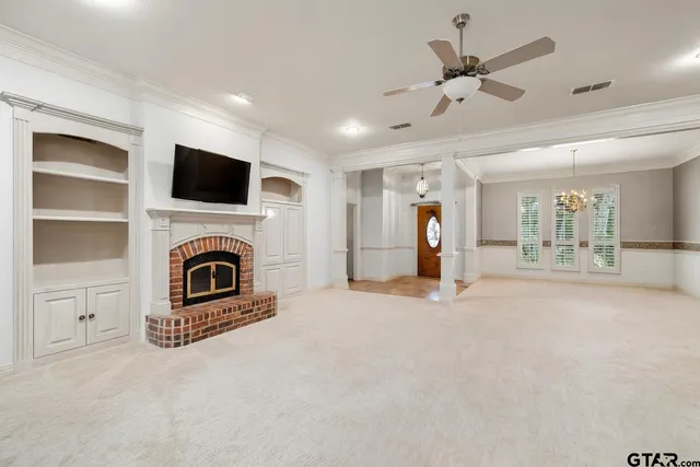a view of livingroom with washer and dryer