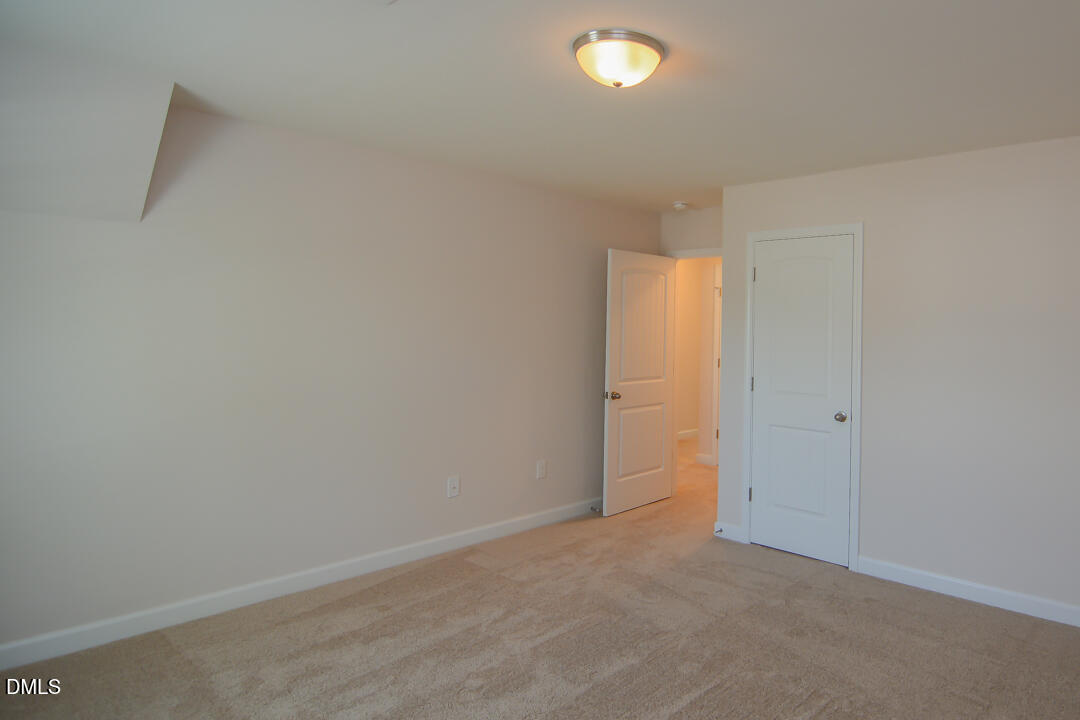 1803 Grandmaster Way Wake Forest, NC 27587 - Photo 21 of 26 a view of an empty room