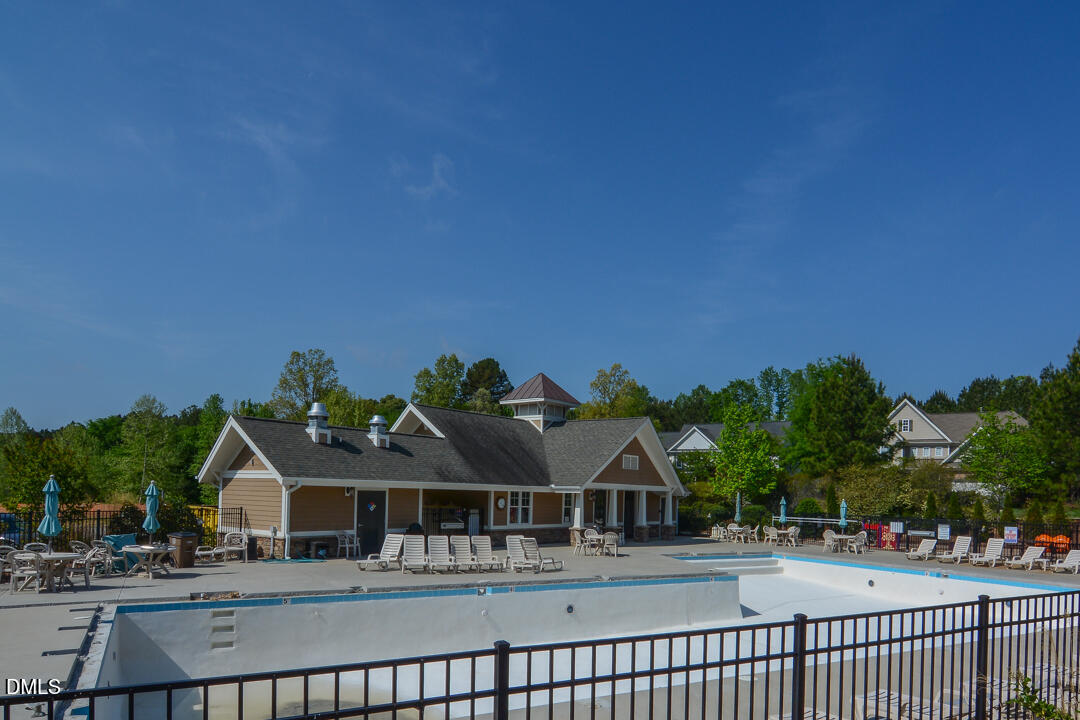 1803 Grandmaster Way Wake Forest, NC 27587 - Photo 25 of 26 a front view of a house with a yard