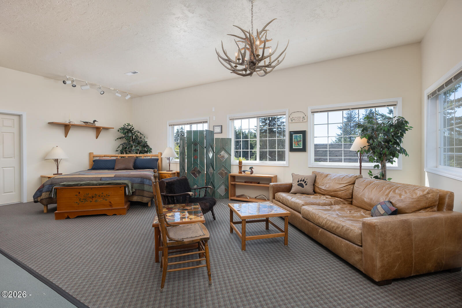6905 Northeast Highland Road Otis, OR 97368 - Photo 45 of 76 a living room with furniture and a large window