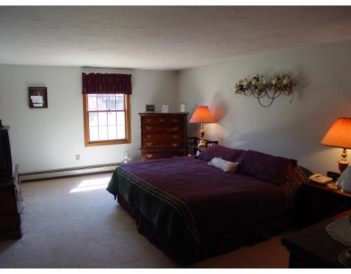 170 Still River Road Bolton, MA 01740 - Photo 11 of 15 a bedroom with a bed and a window