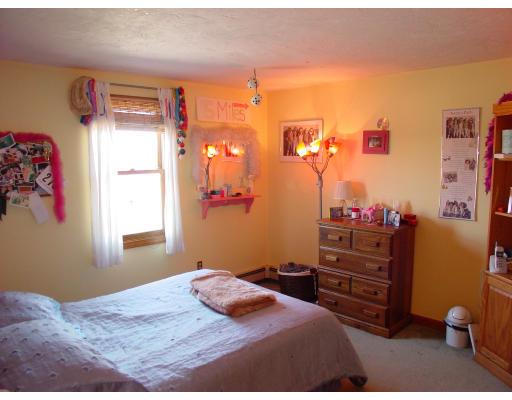 170 Still River Road Bolton, MA 01740 - Photo 12 of 15 a bedroom with a bed and a window