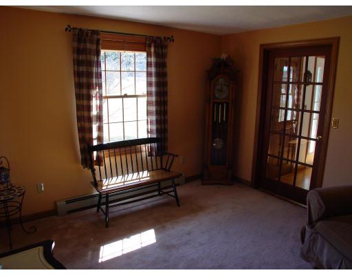 170 Still River Road Bolton, MA 01740 - Photo 7 of 15 a living room with furniture and a window