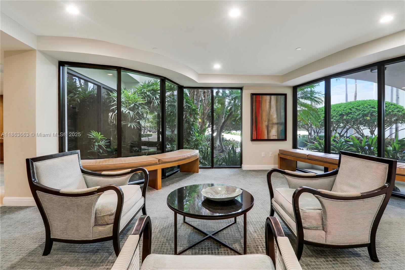 3000 North Ocean Drive, Unit PHD Singer Island, FL 33404 - Photo 64 of 97 a outdoor dining space with furniture and garden view