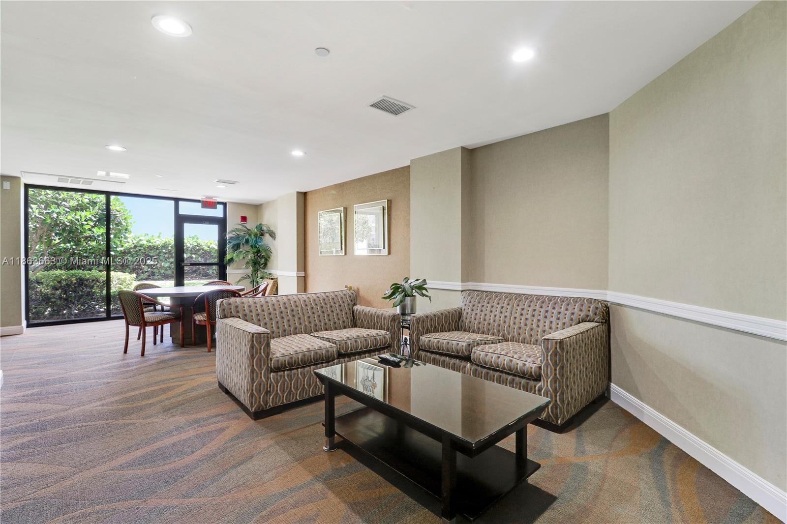 3000 North Ocean Drive, Unit PHD Singer Island, FL 33404 - Photo 66 of 97 a living room with furniture and a large window