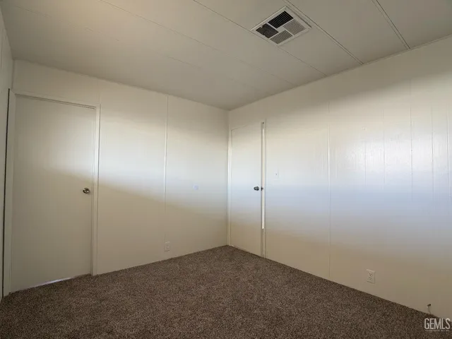 a bathroom with a sink toilet and vanity