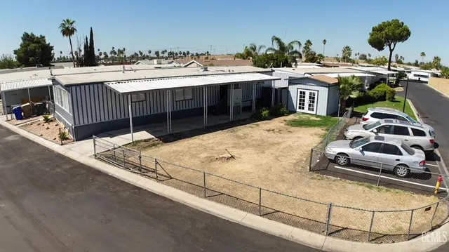 a terrace with a table and chairs