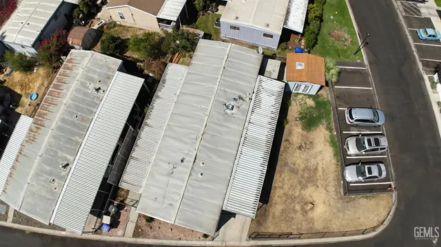 an aerial view of a house with a ocean view