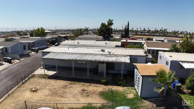 a terrace with a table and chairs