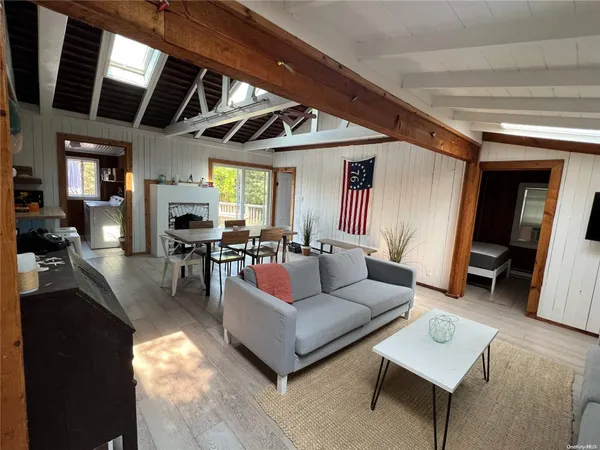 a living room with furniture and a view of living room
