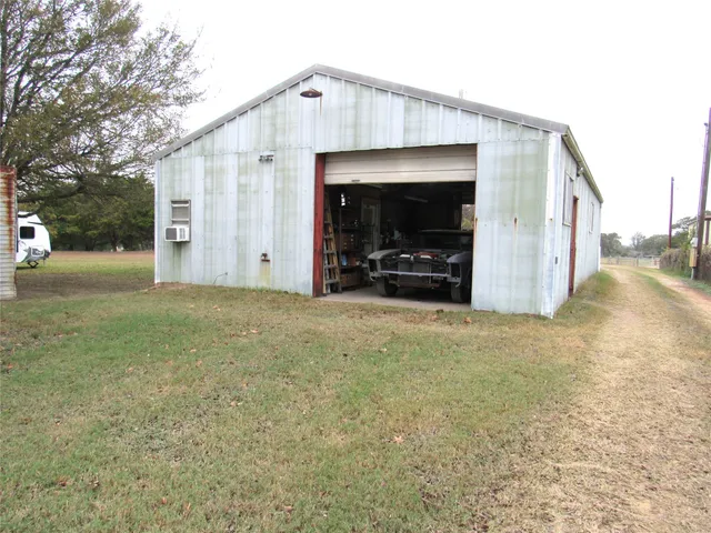 a view of a house with a patio