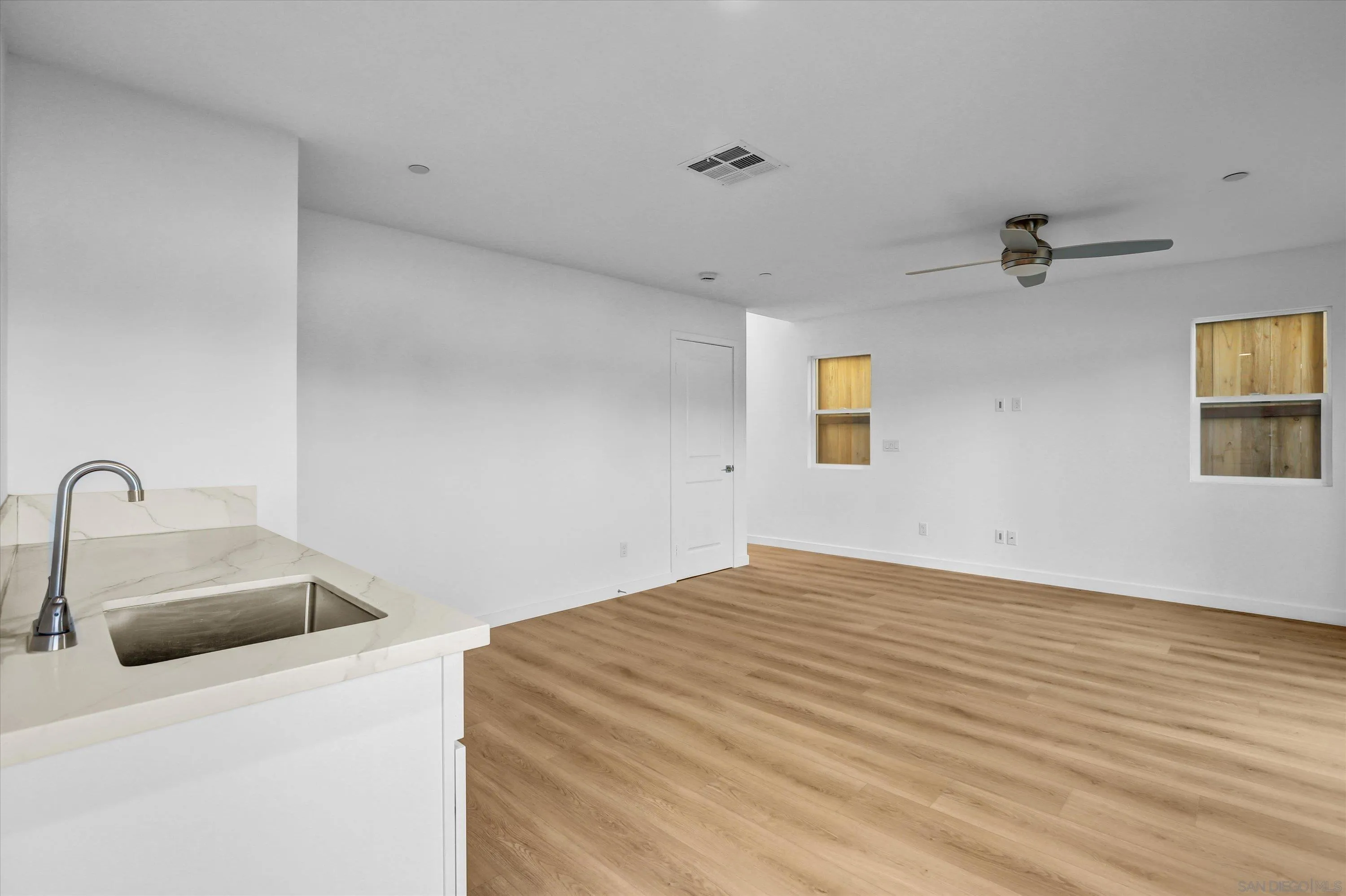 8540 Vista Azul Lemon Grove, CA 91945 - Photo 17 of 33 a bathroom with a sink and a mirror