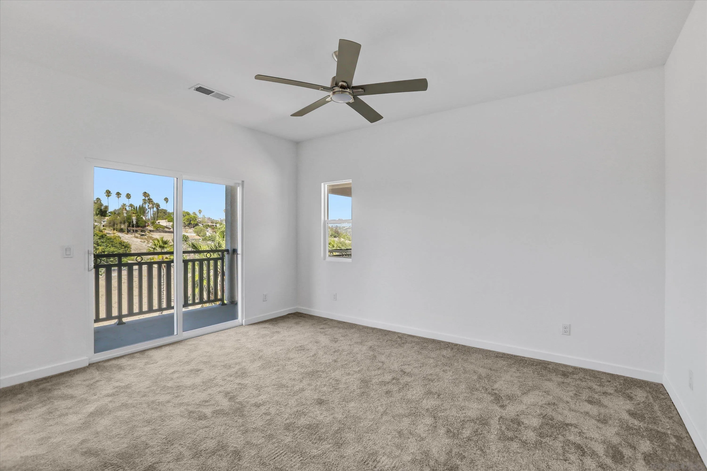 8540 Vista Azul Lemon Grove, CA 91945 - Photo 23 of 33 an empty room with windows