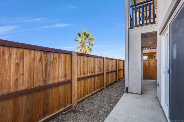 a view of entryway with wooden floor and small space