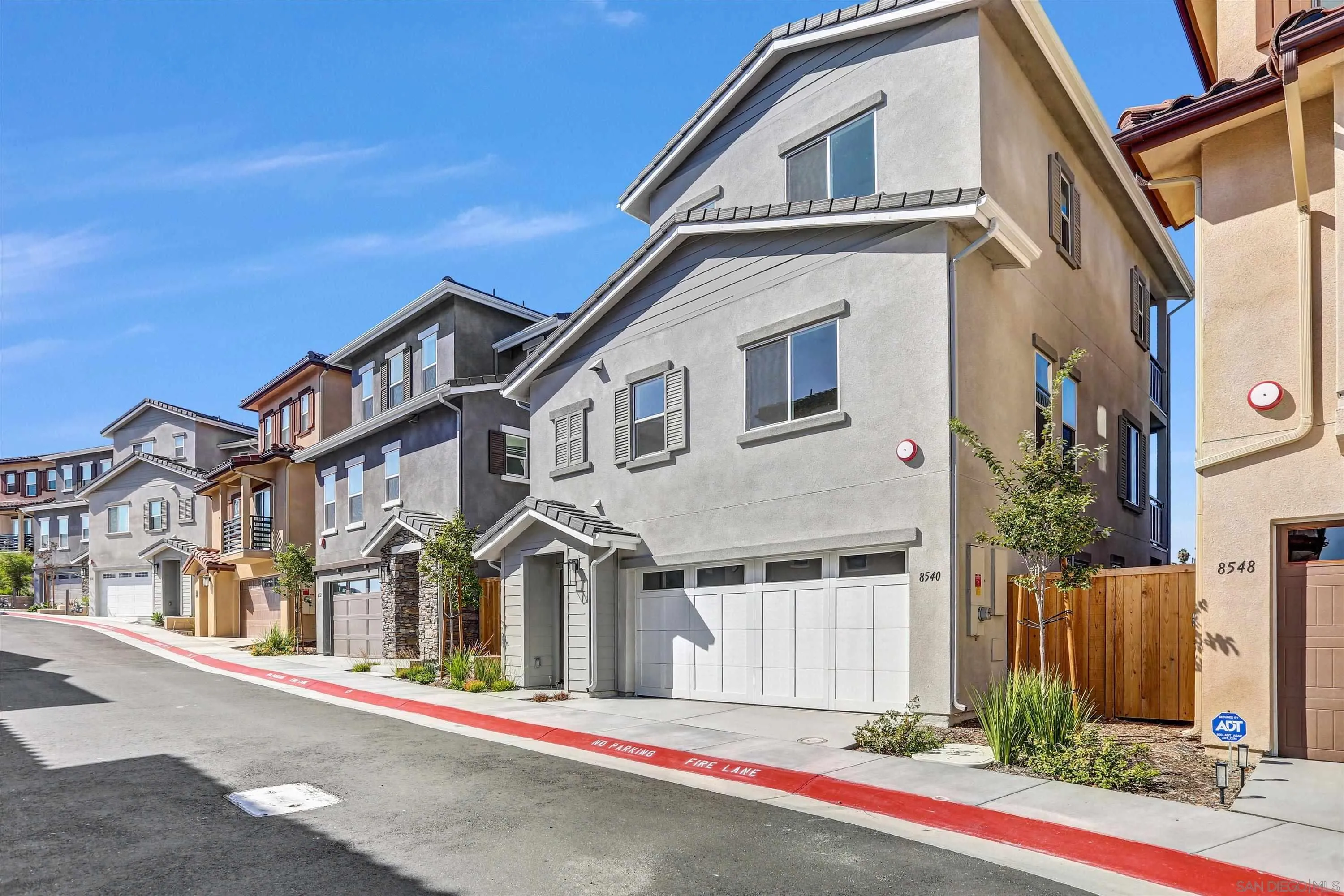 8540 Vista Azul Lemon Grove, CA 91945 - Photo 33 of 33 a front view of a house with garage