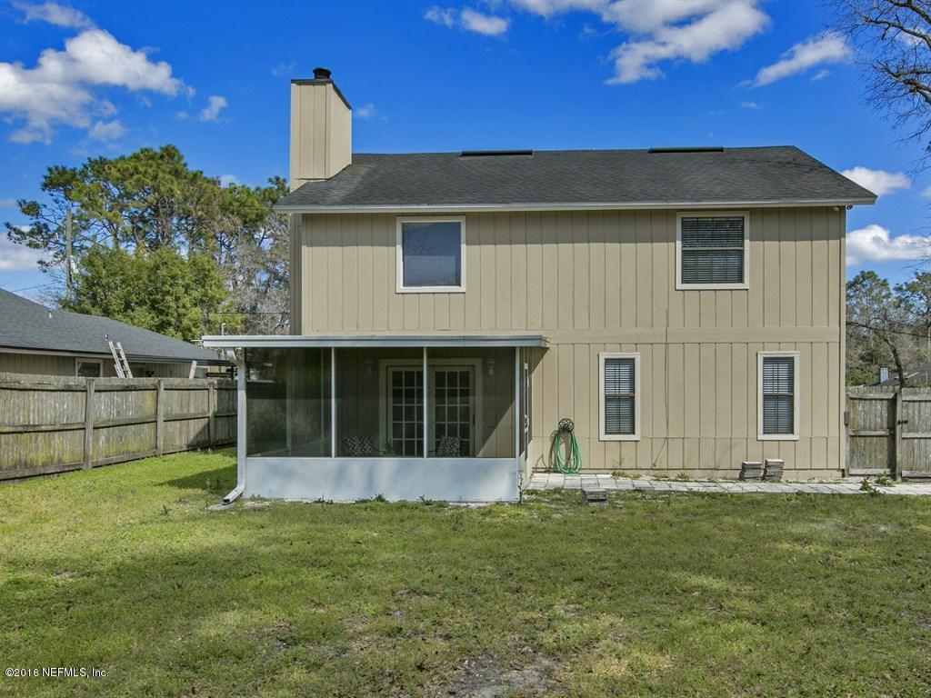 12788 Attrill Road Jacksonville, FL 32258 - Photo 17 of 20 a front view of a house with garden