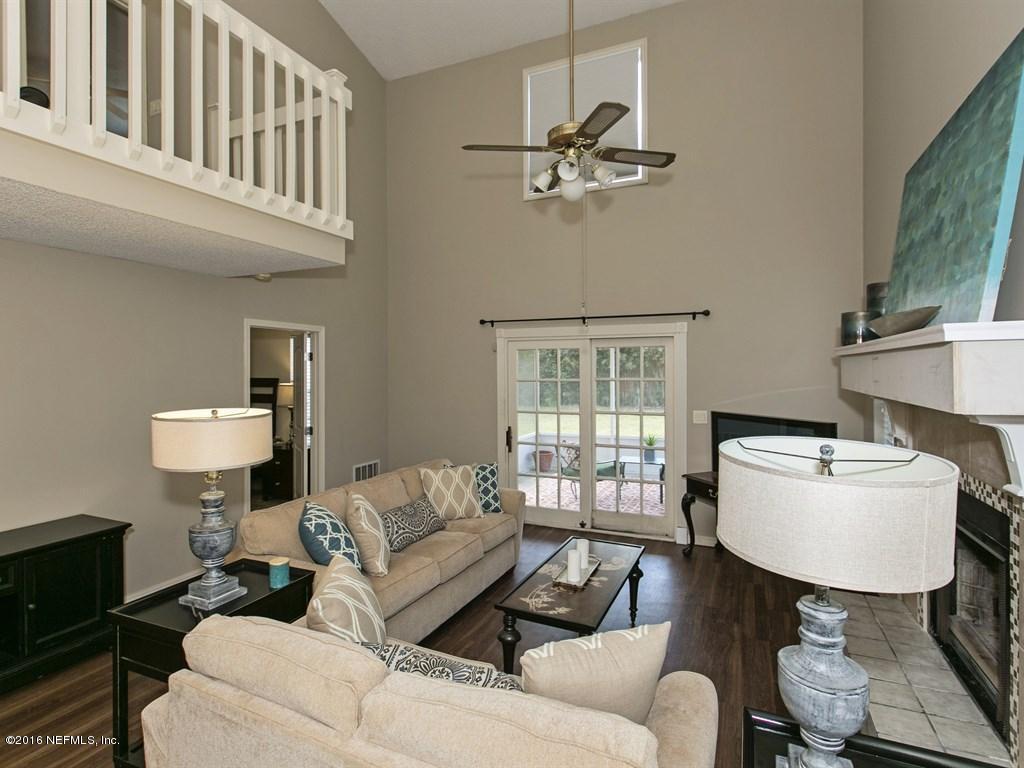 12788 Attrill Road Jacksonville, FL 32258 - Photo 4 of 20 a living room with furniture and a window