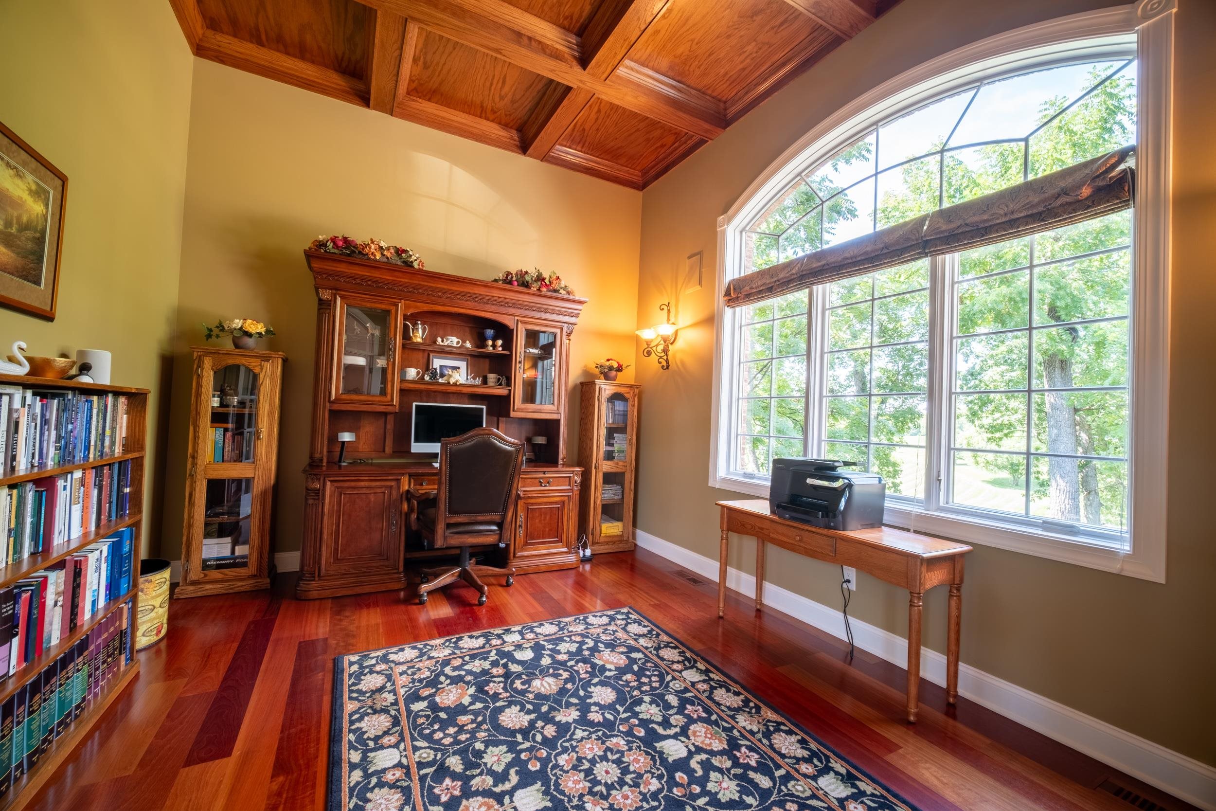 163 Russell Road Oregon, IL 61061 - Photo 17 of 66 a room with lots of furniture and a book shelf