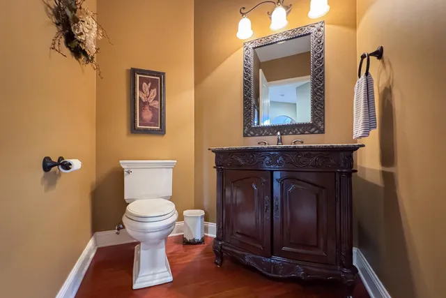 a bedroom with a bed and a fireplace