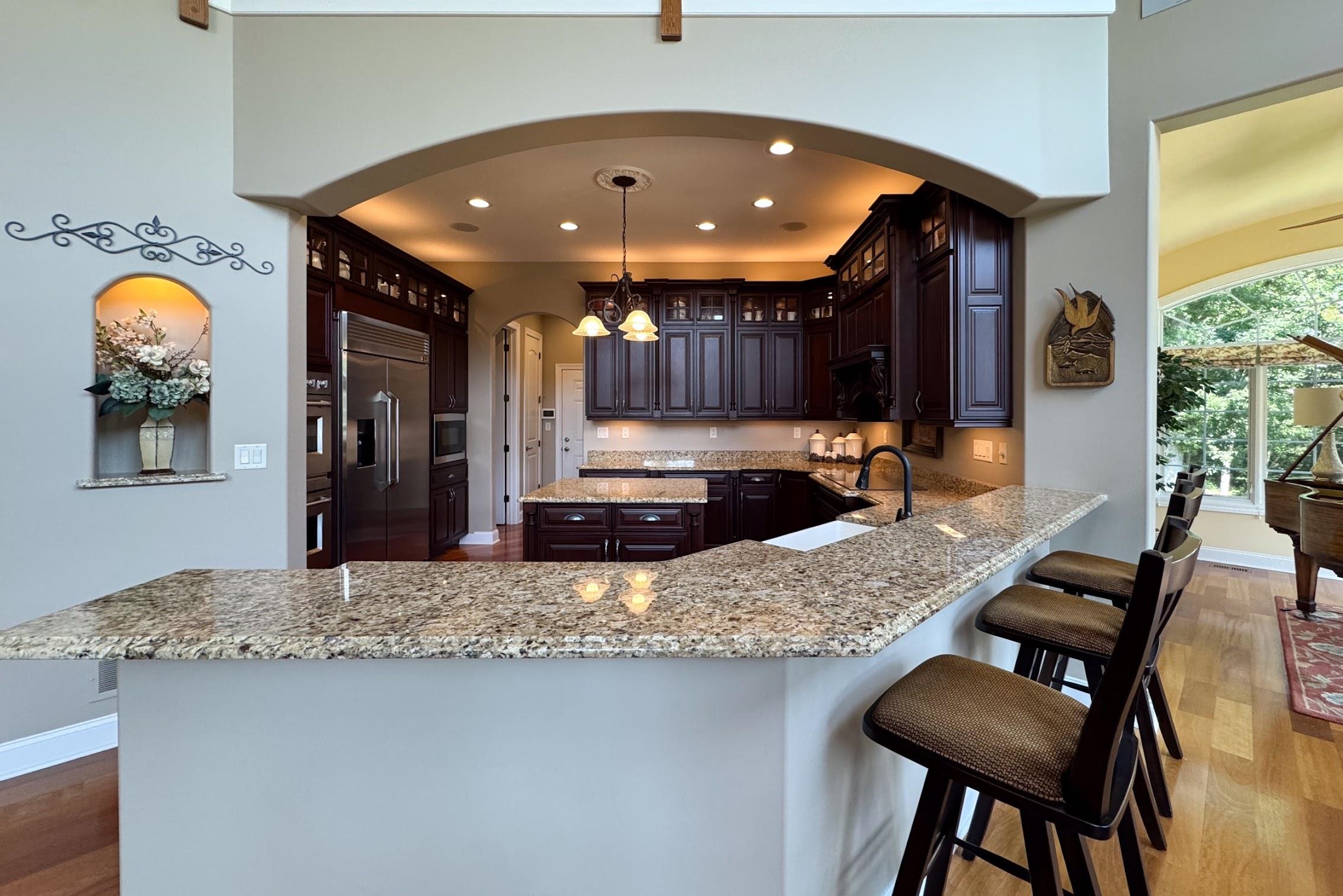 163 Russell Road Oregon, IL 61061 - Photo 25 of 64 a kitchen with a table and chairs in it