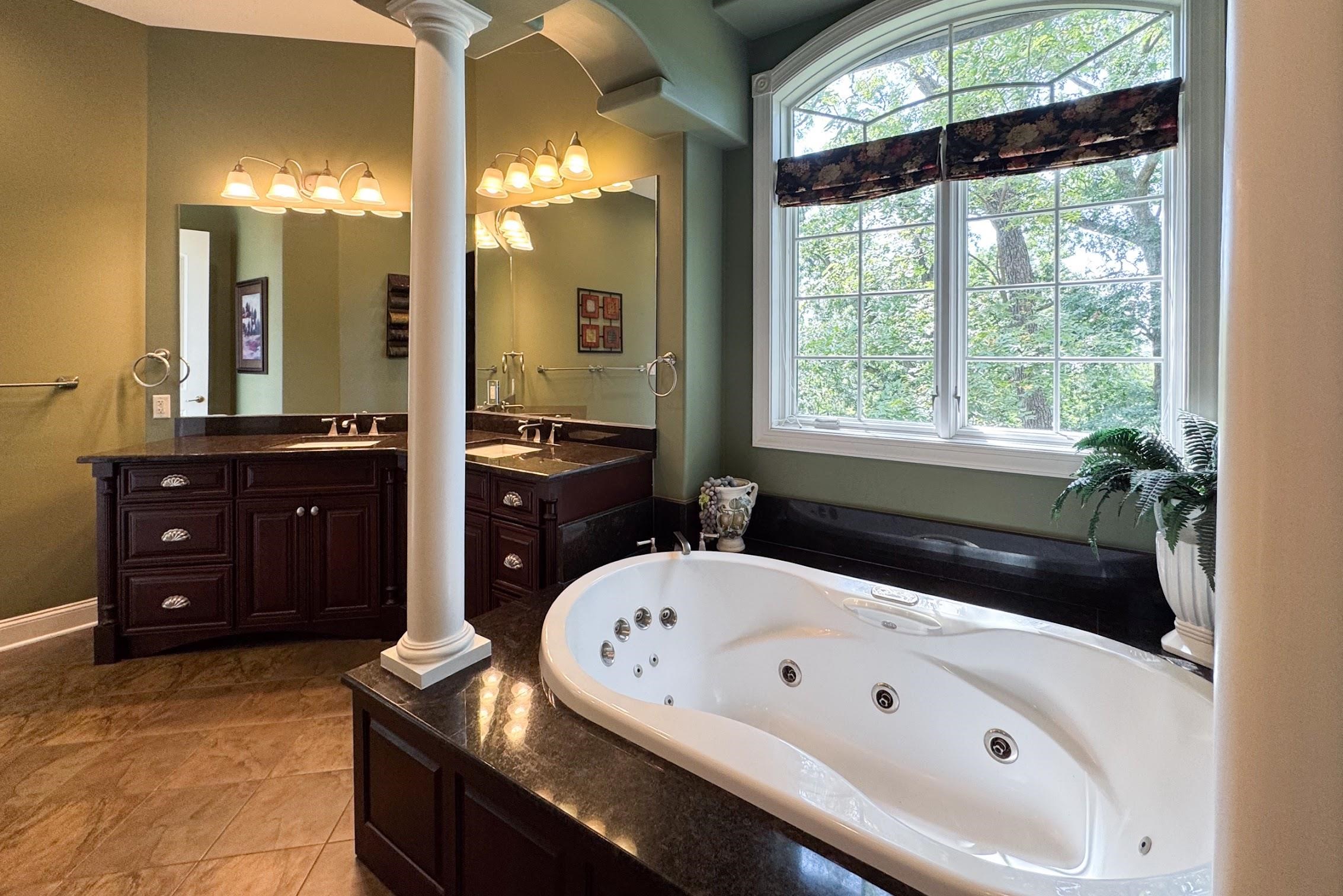 163 Russell Road Oregon, IL 61061 - Photo 33 of 64 a bathroom with a bathtub and a sink