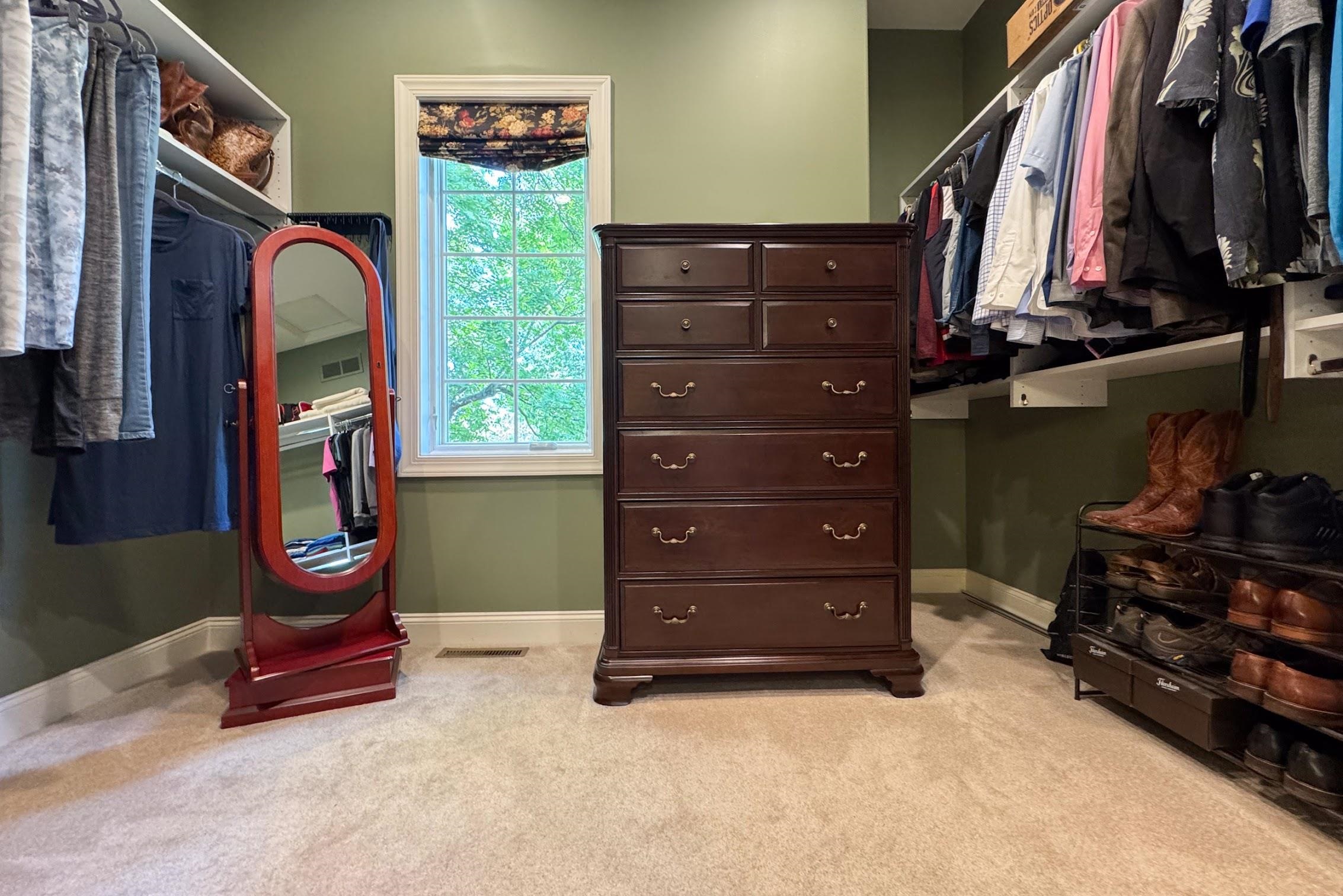 163 Russell Road Oregon, IL 61061 - Photo 34 of 66 a room with lots of furniture and clothes