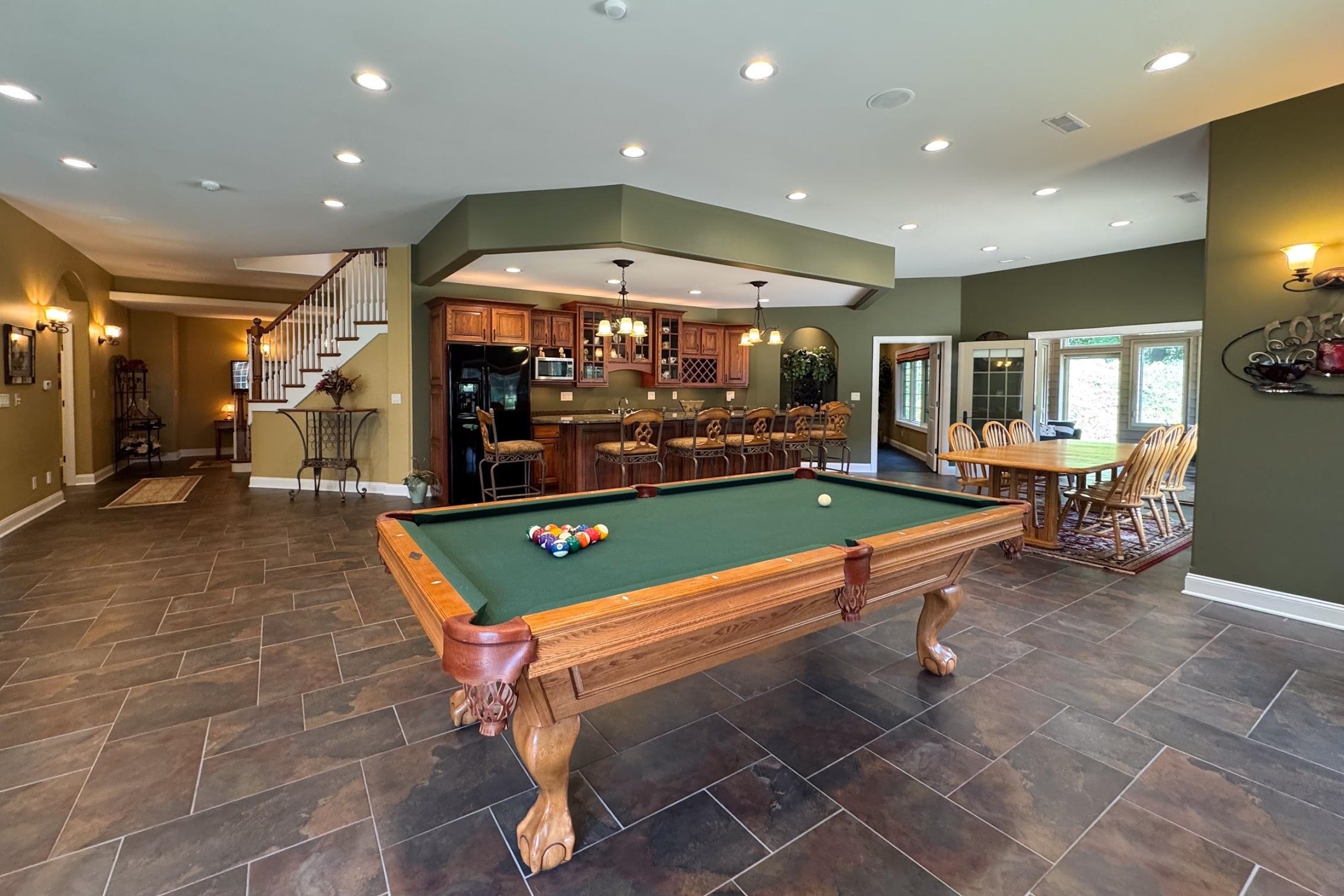 163 Russell Road Oregon, IL 61061 - Photo 50 of 66 a room with pool table and windows