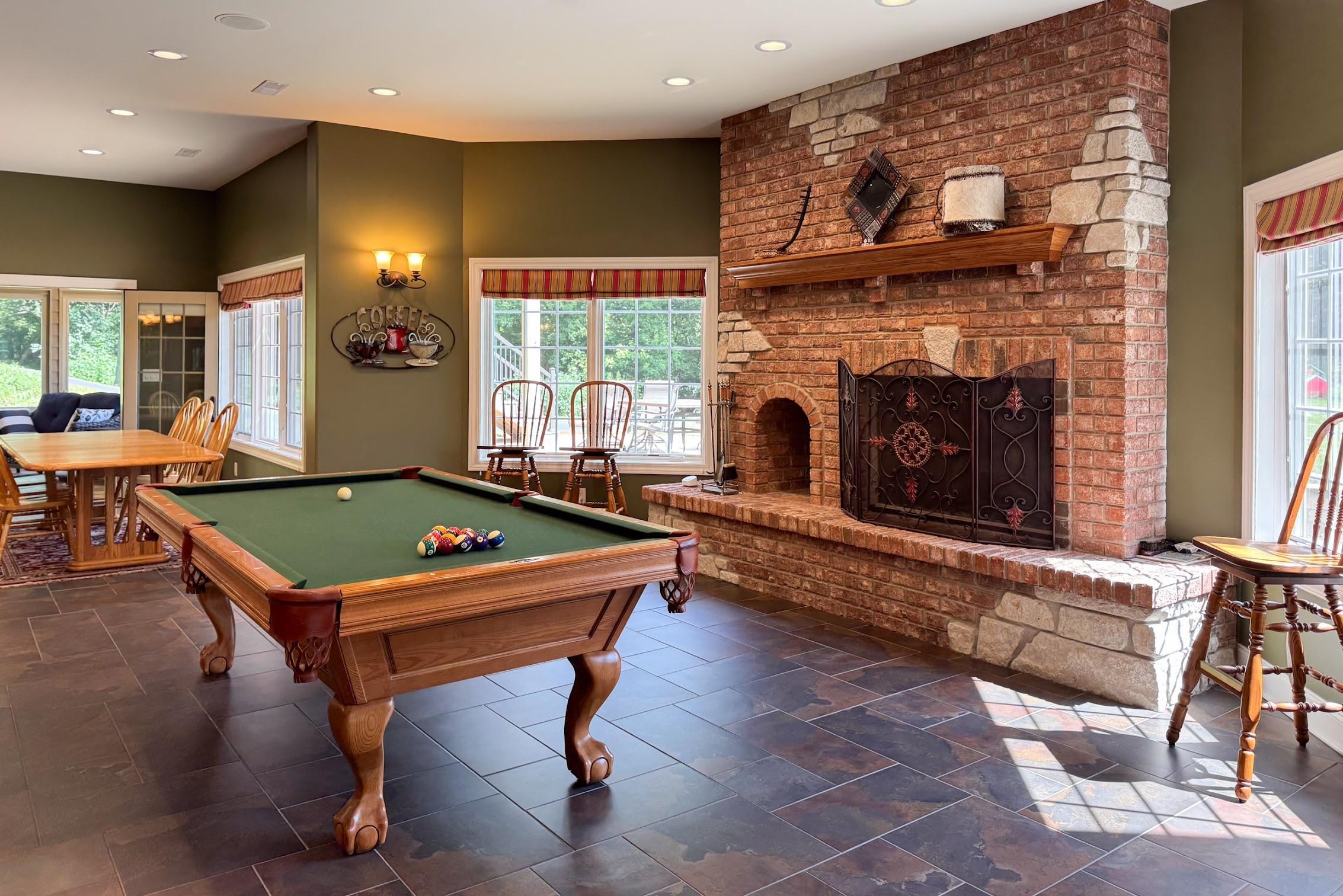 163 Russell Road Oregon, IL 61061 - Photo 52 of 66 a room with pool table and windows