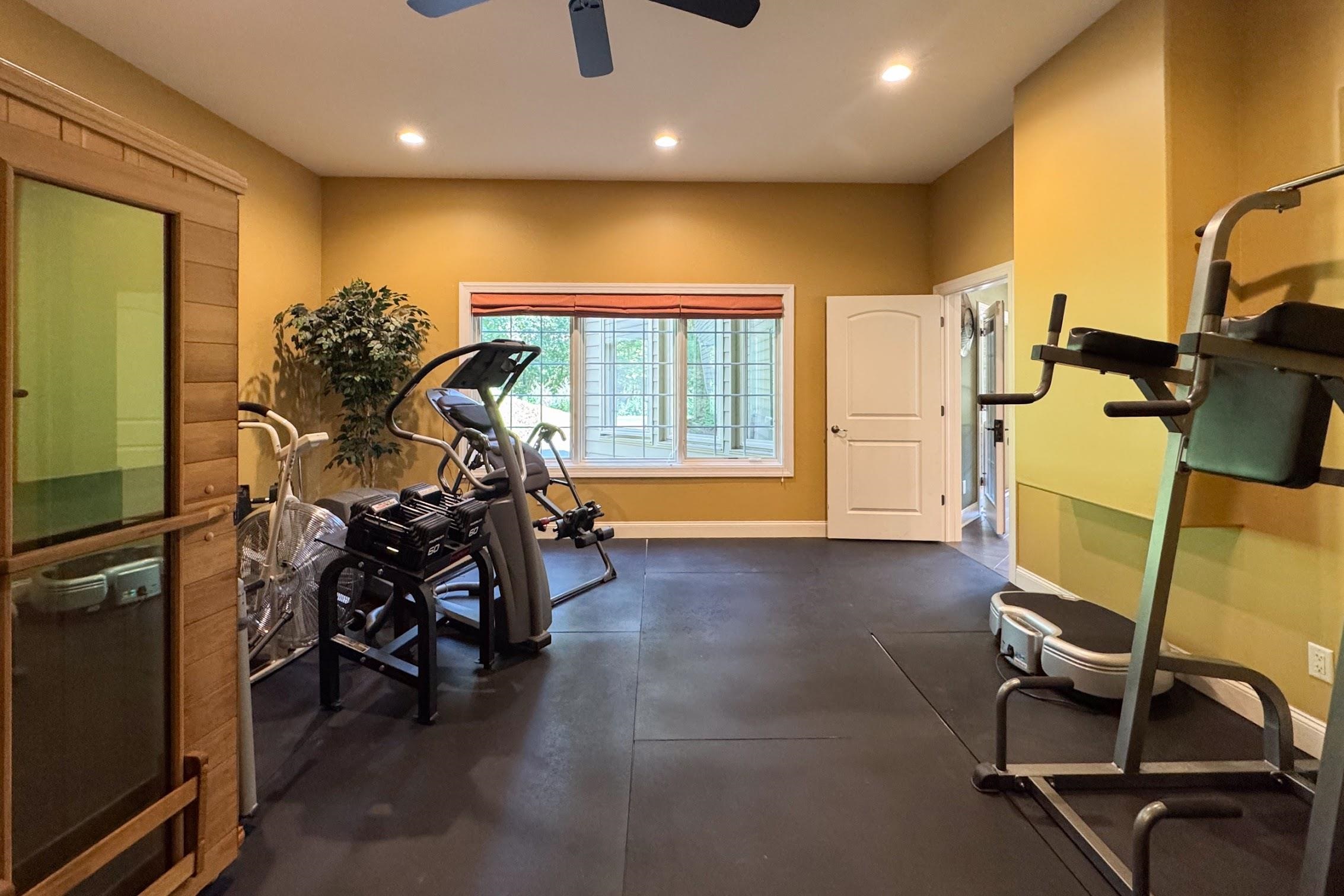 163 Russell Road Oregon, IL 61061 - Photo 59 of 64 a view of a room with gym equipment