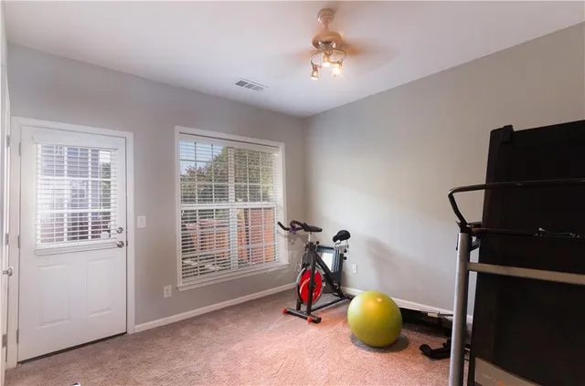 a view of a room with gym equipment