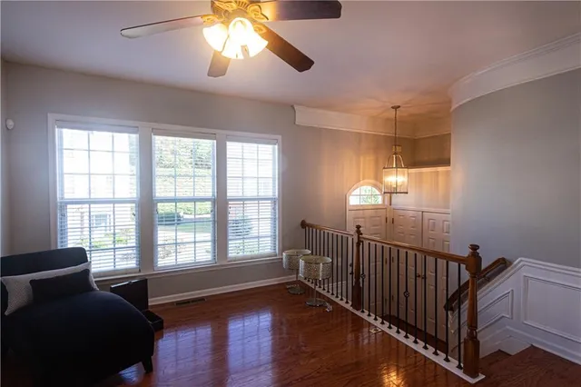 a view of livingroom with furniture and windows
