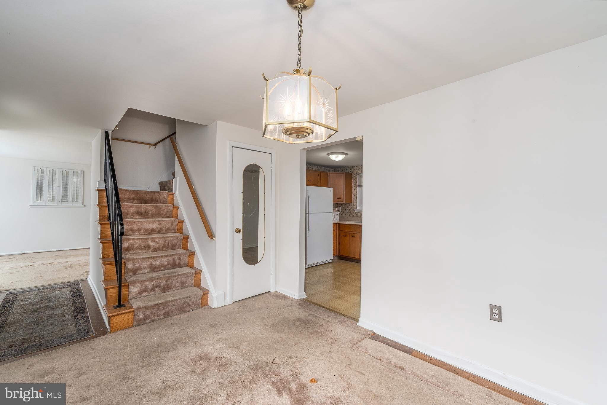 1412 Willshire Drive Aberdeen, MD 21001 - Photo 11 of 28 a view of a hallway with entryway windows wooden floor and front door