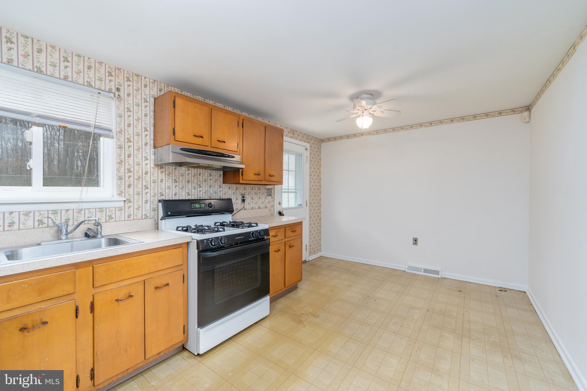 1412 Willshire Drive Aberdeen, MD 21001 - Photo 13 of 28 a kitchen with cabinets stainless steel appliances and a sink