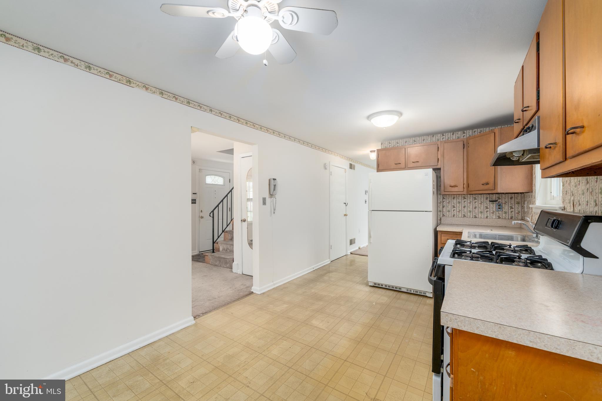 1412 Willshire Drive Aberdeen, MD 21001 - Photo 14 of 28 a kitchen with refrigerator and cabinets