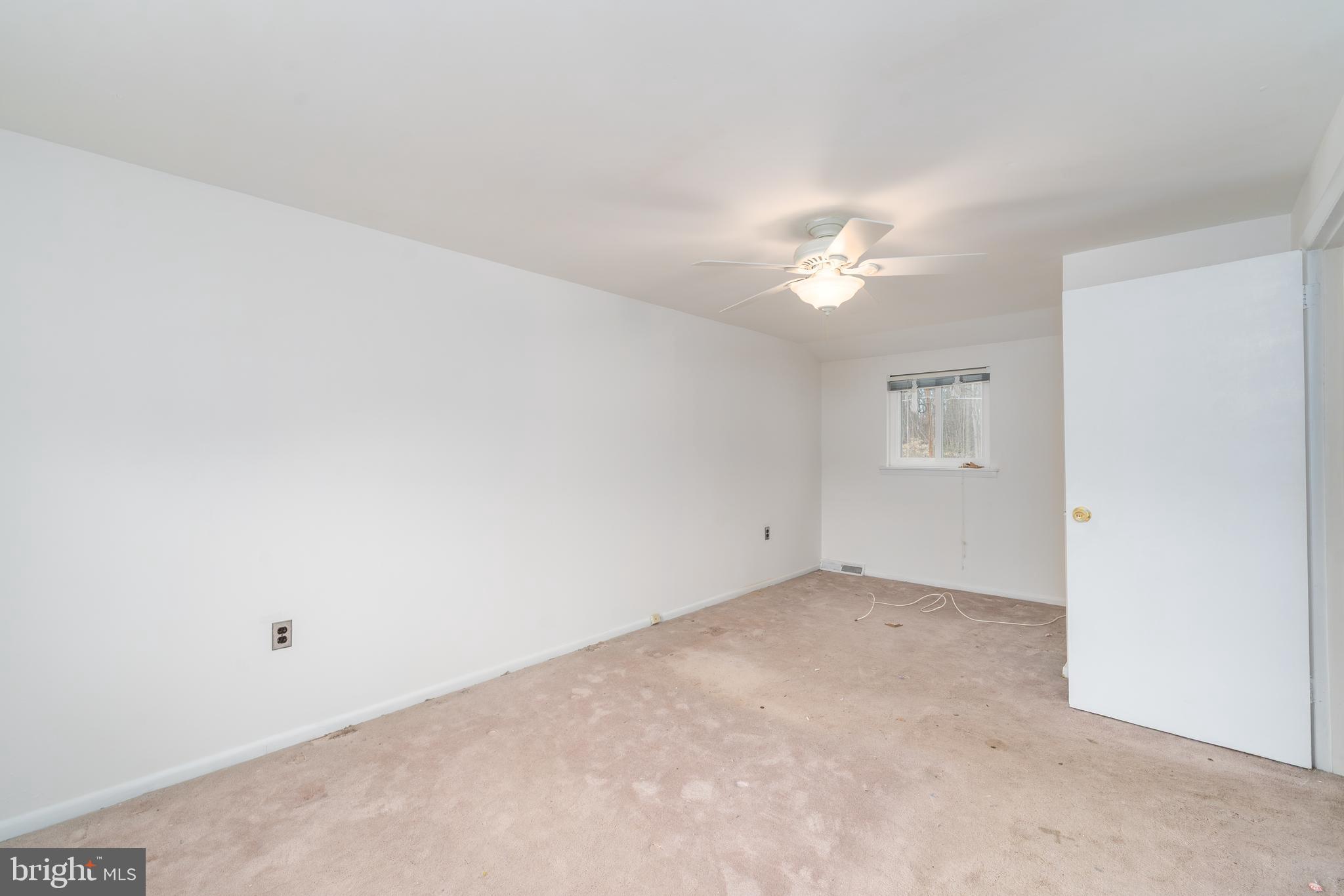1412 Willshire Drive Aberdeen, MD 21001 - Photo 20 of 28 a view of a room with a ceiling fan and a window
