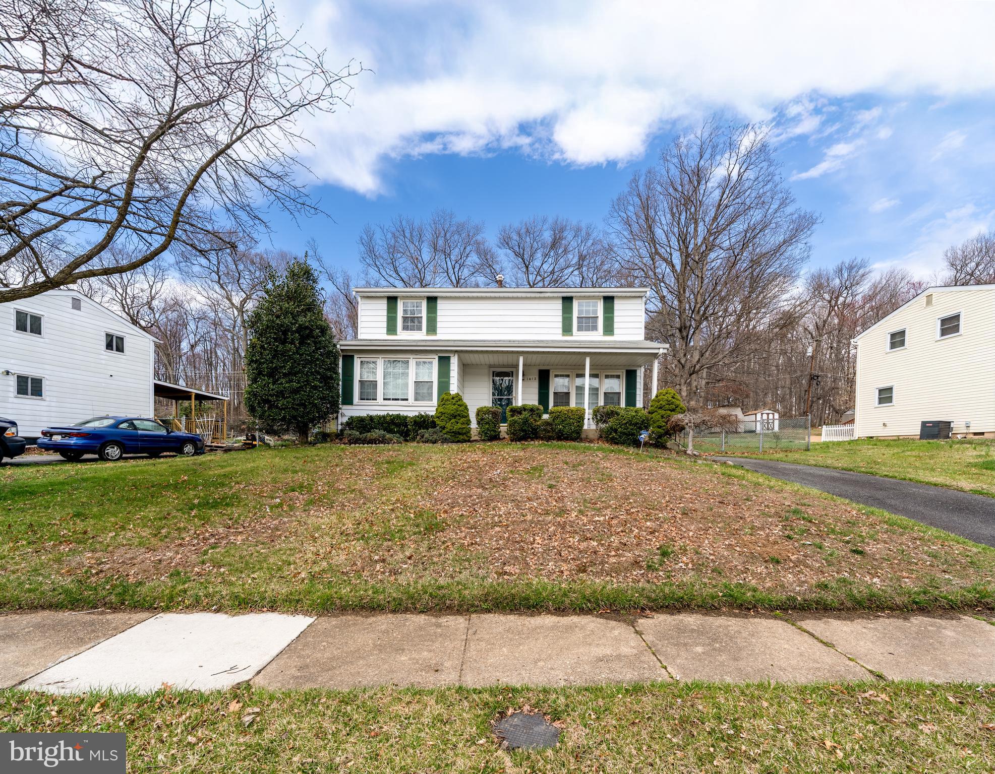 1412 Willshire Drive Aberdeen, MD 21001 - Photo 2 of 28 a front view of a house with a yard and trees