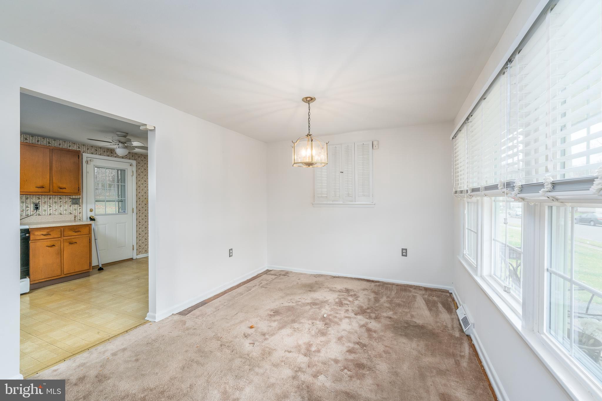 1412 Willshire Drive Aberdeen, MD 21001 - Photo 4 of 28 wooden floor in an empty room with a window