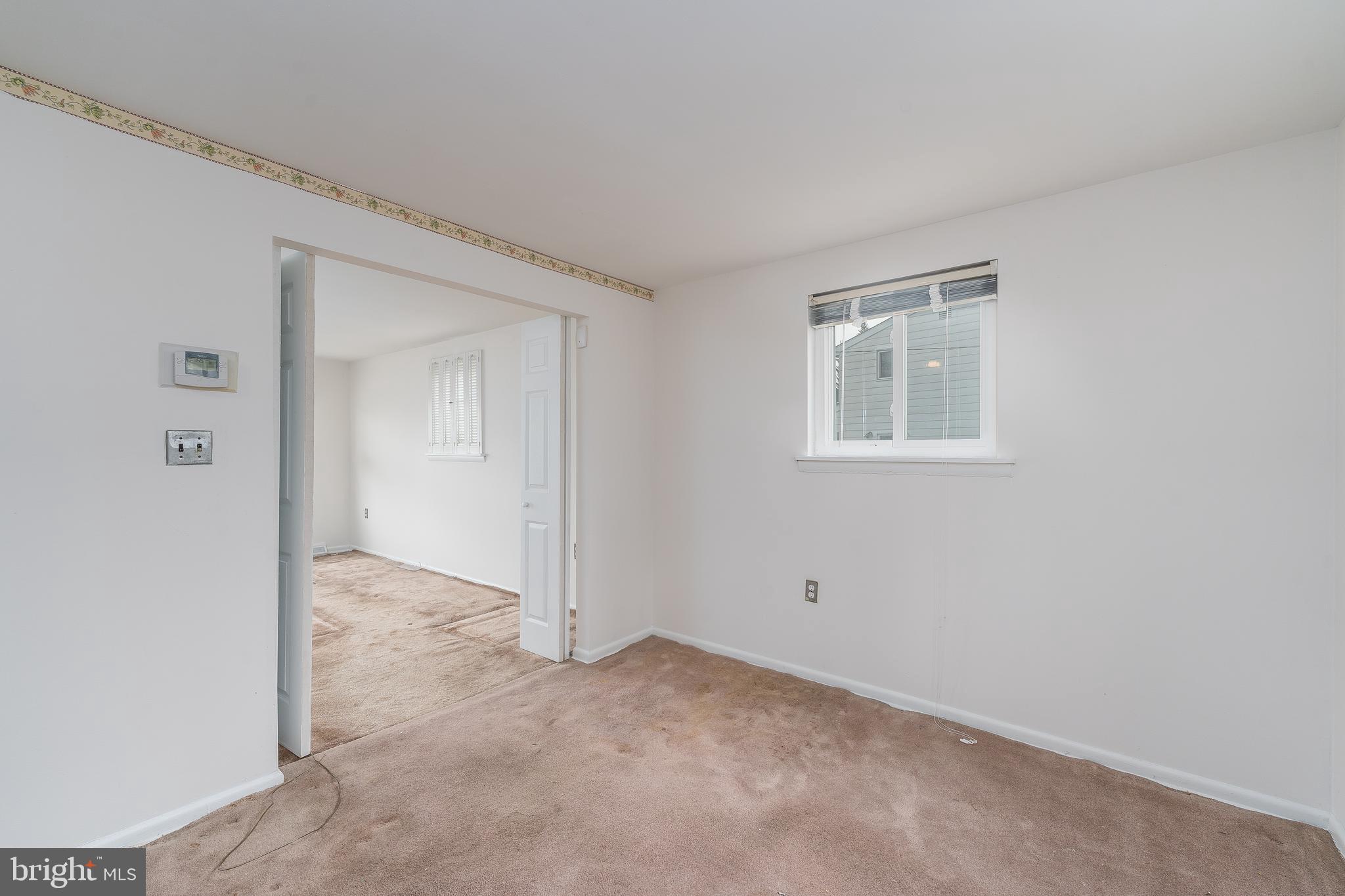 1412 Willshire Drive Aberdeen, MD 21001 - Photo 9 of 28 a view of an empty room with windows and closet